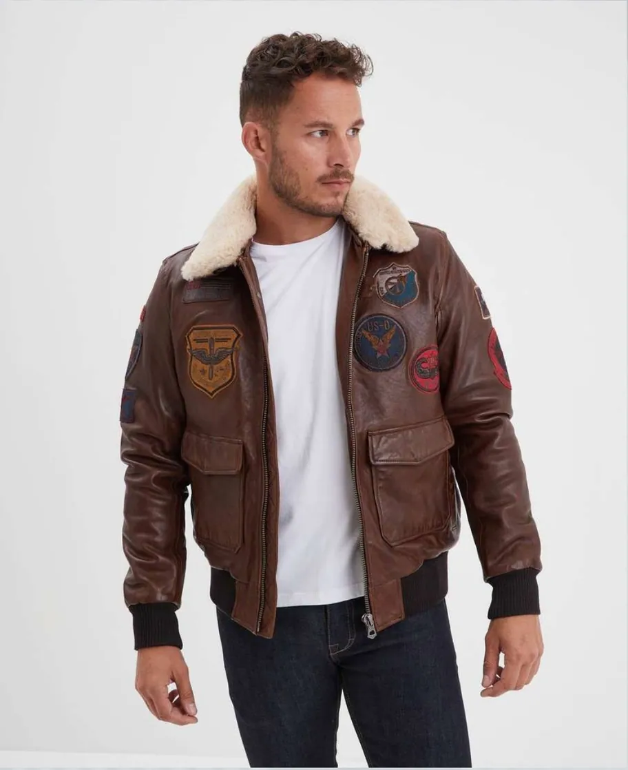 Brown leather flight jacket with shearling collar, worn by a male model