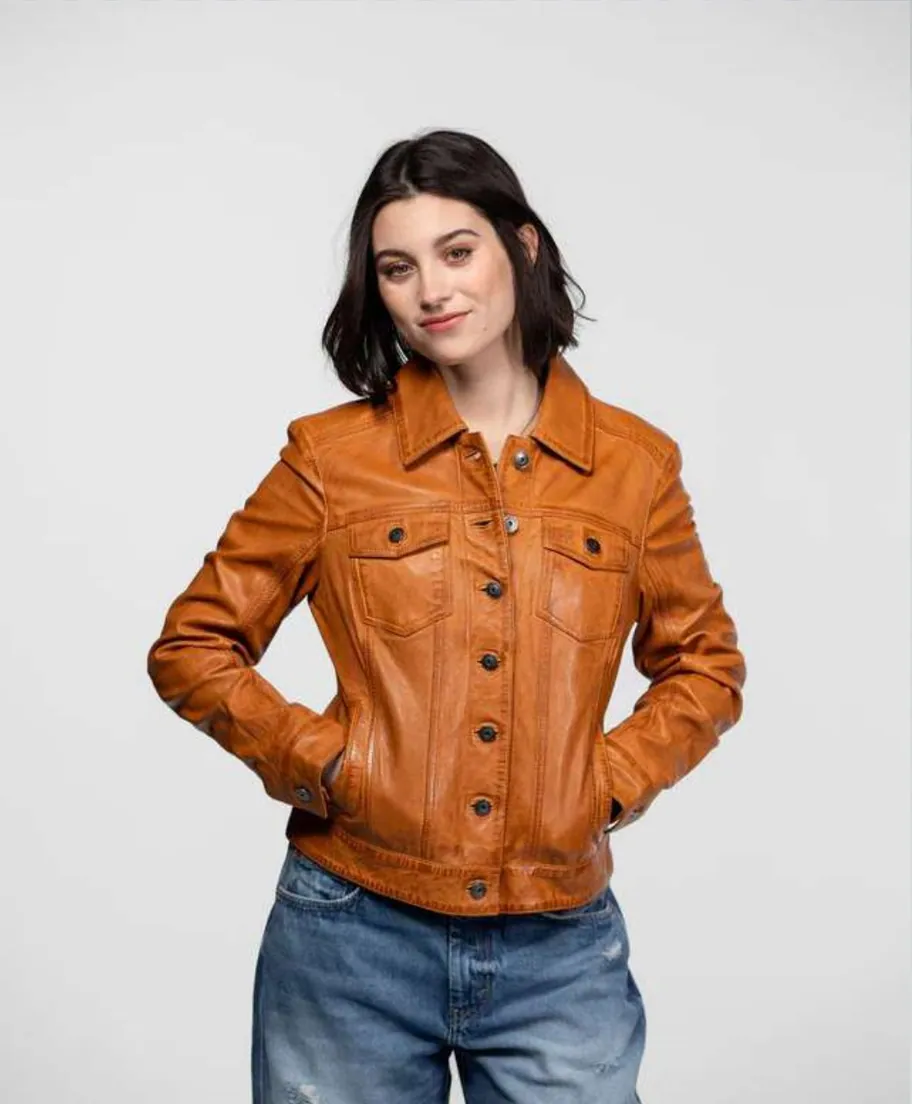 Tan leather trucker jacket, women's, worn by a female model