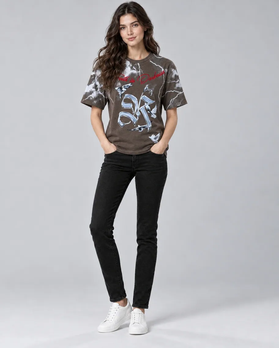 Brown washed tee with lightning graphic, worn by a female model