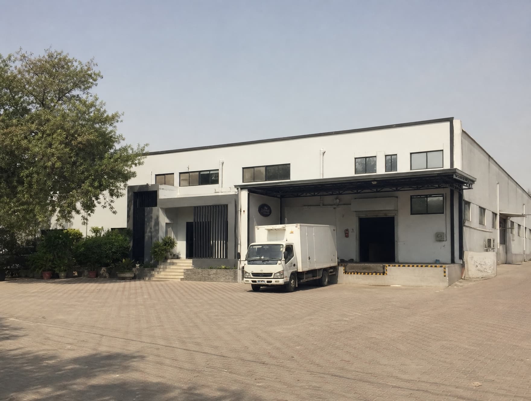 Exterior of a Pakistani export garment facility in daylight