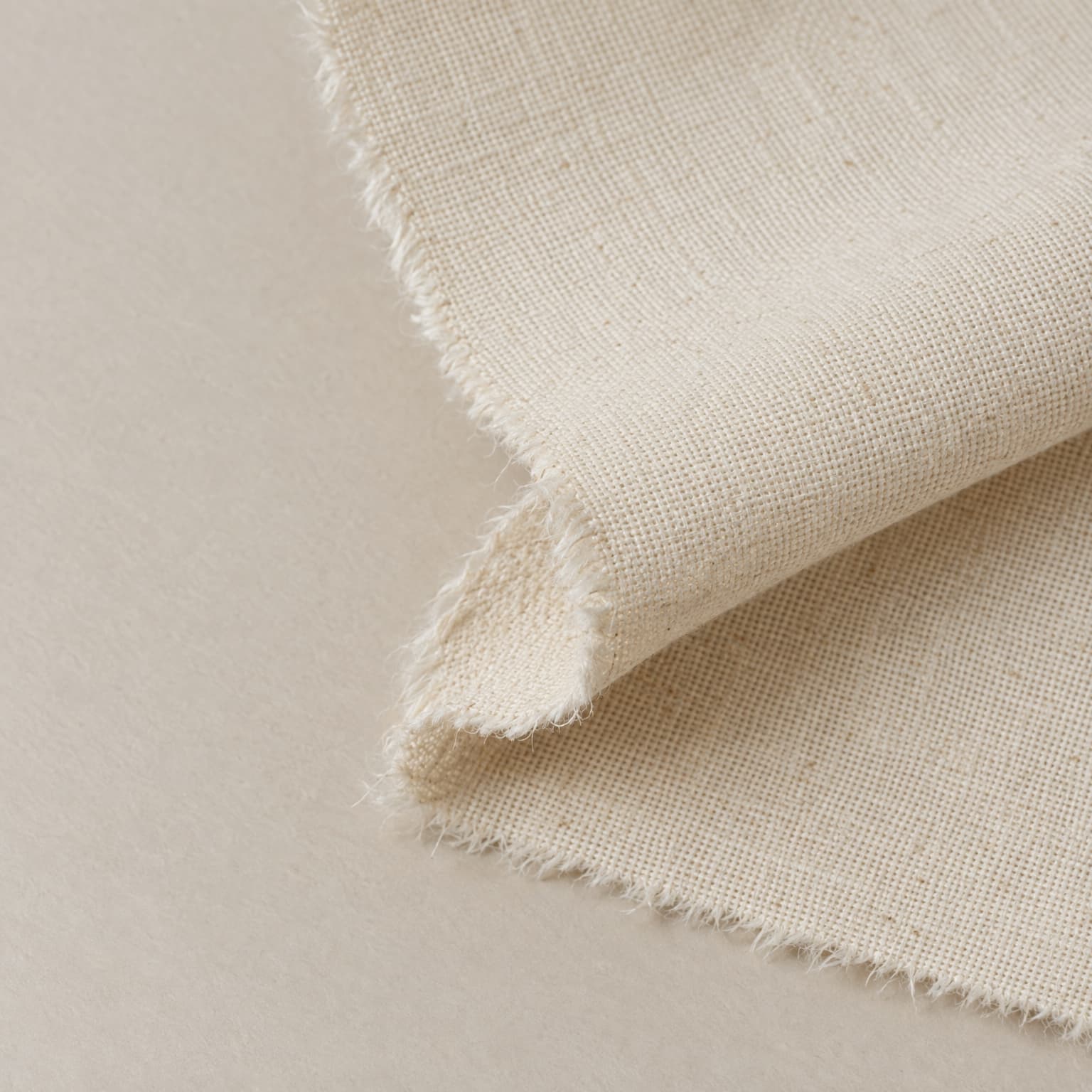 Macro detail of raw cotton fibre weave