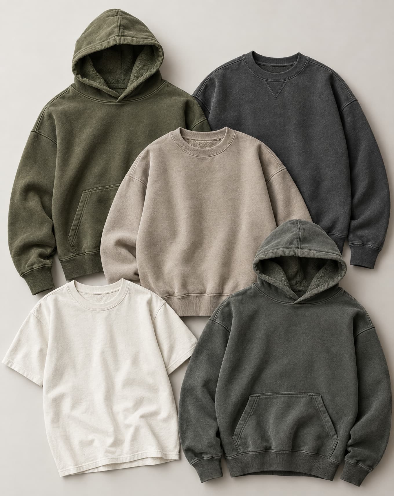 A heavyweight hoodie on a hanger, showing fabric weight and rib construction